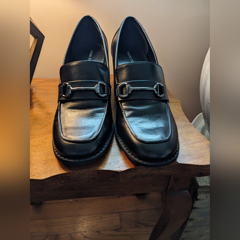 Women's black heeled loafers